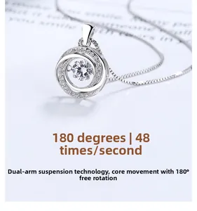 Detailed macro view showing the suspension technology and 180-degree dancing heart pendant
