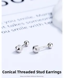 Macro detail of S925 sterling silver cone stud earrings with brushed texture and screw back