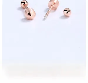 Detail of rose gold S925 sterling silver stud earring with threaded screw back closure