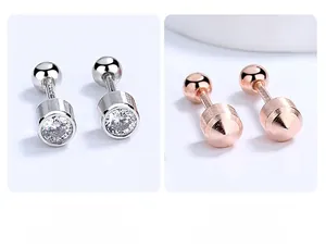 Detail of S925 silver stud earrings with zircon inlay and brushed metal cone design