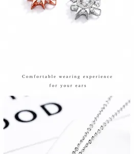 Close-up of S925 silver asteroid star necklace and matching stud earrings detail