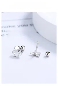 Detailed macro view of S925 sterling silver starfish earrings with screw ball backs