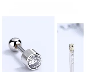 Macro detail of S925 sterling silver stud earring showing the S925 hallmark and zircon stone