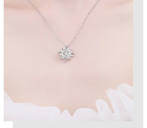 Elegant 925 sterling silver star necklace pendant worn on a female model's collarbone