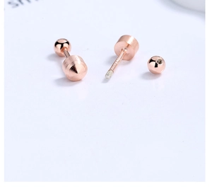Detailed view of S925 sterling silver stamp on rose gold threaded stud earrings