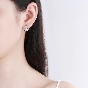 Minimalist 925 silver irregular pearl stud earrings featuring a U-shaped hollow design
