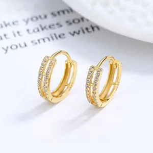Detail view of double-layer hoop earrings with S925 sterling silver stamp and zircon stones
