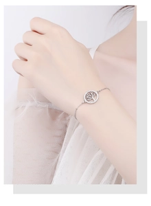 Detail of a 925 sterling silver Tree of Life bracelet with pavé cubic zirconia crystals