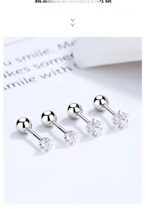 Detailed view of four S925 sterling silver star stud earrings with zircon stones