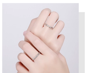 Close-up of minimalist S925 sterling silver bamboo joint rings on model's hand