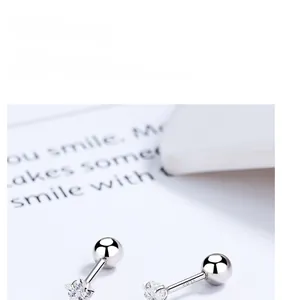 Close-up of S925 sterling silver star stud earring featuring a zircon stone and screw back