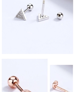 Macro shot of 925 sterling silver triangle screw back earrings with crystal zircon inlay