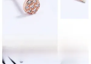 Macro view showing rose gold screw back design and micro-pave white zircon settings