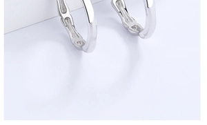 Macro shot of silver bamboo style ring showing detailed segments and polished finish
