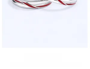 Close-up of 925 sterling silver ring featuring a vibrant red enamel inlay detail