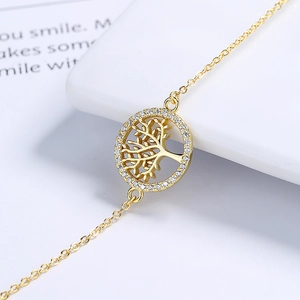 925 silver Tree of Life gold bracelet with sparkling cubic zirconia on a white background