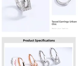 Gros plan sur les boucles d'oreilles en argent S925 avec zircone et poinçon S925