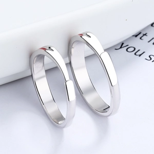 Minimalist 925 sterling silver couple rings with red enamel heart design and open band