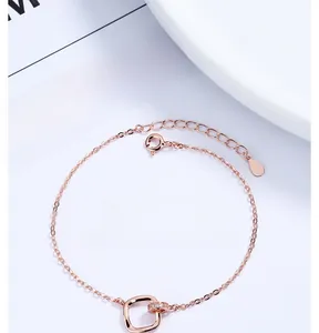 Detail of rose gold double ring bracelet with sparkling pavé cubic zirconia inlay