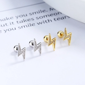 Lightning bolt screw back earrings in gold and silver finish with zircon stones