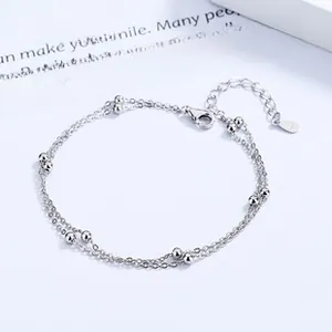 Detail of 925 sterling silver double-layer bead bracelet with adjustable lobster clasp