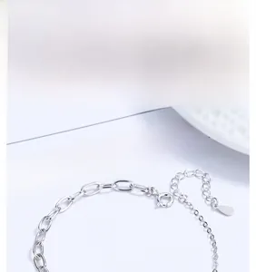 Close-up of S925 sterling silver interlocking oval link bracelet with lobster clasp detail