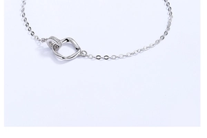 Detail of 925 silver Mobius bracelet with interlocking rings and pavé zircon stones