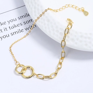 Minimalist S925 sterling silver interlocking double circle bracelet with gold plating
