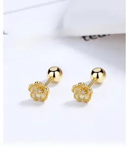 Detailed close-up of S925 sterling silver cherry blossom earrings with gold finish