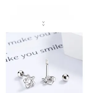 Detailed view of 925 sterling silver star stud earrings with secure screw-back closures