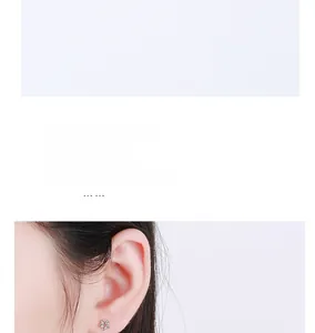 Detailed view of 925 sterling silver hollow star stud earrings with threaded screw back