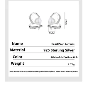 Detailed view of 925 sterling silver heart pearl earrings with size 15x6mm and 2.22g weight