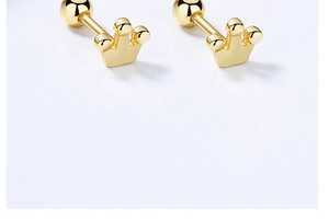 Detail of 925 sterling silver crown screw-back studs with polished gold finish