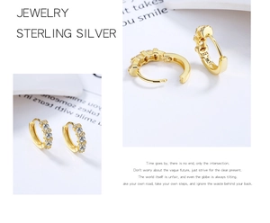 Detailed close-up of 925 sterling silver gold hoop earrings with zircon pavé setting