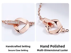 Detail of rose gold bracelet featuring hand-polished links and hand-set pavé stones