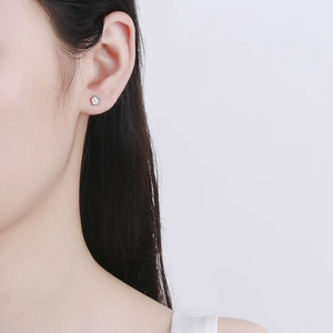 Minimalist 925 sterling silver cherry blossom stud earring with a central zircon stone