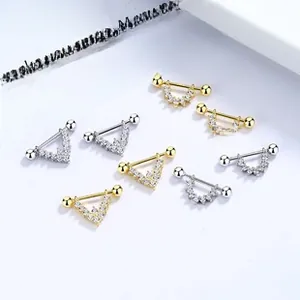 Detailed macro view of 925 silver U-shaped star earrings with pavé zircons and screw backs