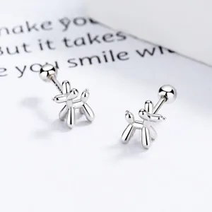 Macro shot of 925 sterling silver balloon dog earrings with mirror polished finish