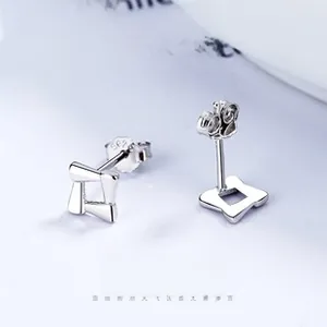 Detailed close-up showing the S925 hallmark on minimalist geometric silver stud earrings