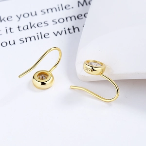 Minimalist 925 sterling silver gold plated hook earrings with bezel set cubic zirconia
