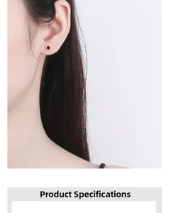 Detailed close-up of a 925 sterling silver stud earring with red enamel and Roman numerals
