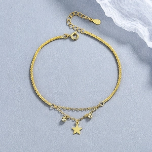 Double-layered 925 sterling silver star bracelet with shimmering beads in gold finish