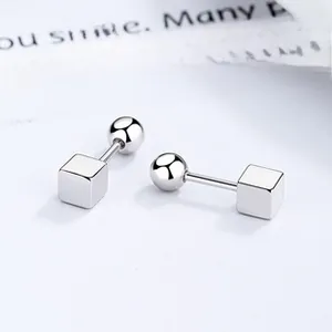Detailed view of 925 silver geometric cube stud earrings with screw back design
