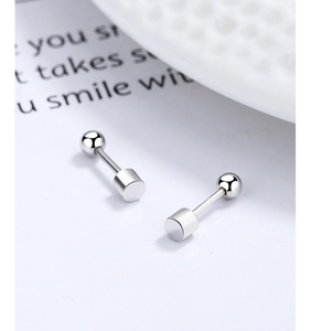 Macro shot of S925 sterling silver stamp on minimalist barbell screw stud earrings