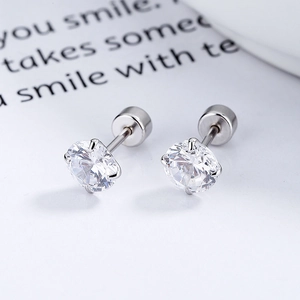 Classic 925 sterling silver four-prong stud earrings with round white zircon stones
