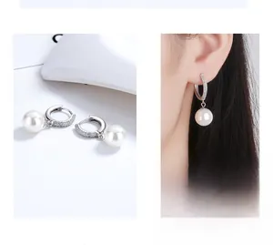 Detail of silver pearl earrings showing 925 sterling silver hoop and model wearing look