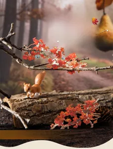 Close-up of Four Seasons leaf stickers with forest elements like pine cones and acorns