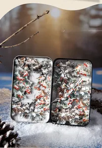 Winter snow scene 3D paper carving art in vintage tin box with birds and pine needles