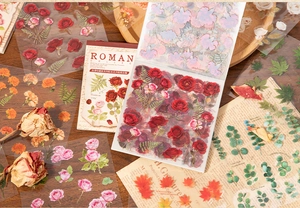 Detailed view of botanical PET stickers with roses and leaves for vintage journaling