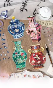 Macro view of Chinese porcelain theme PET stickers on wooden desk with art props
